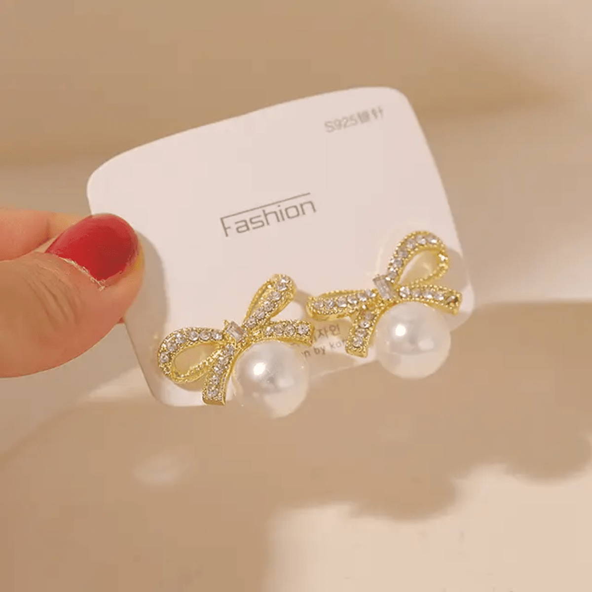 Korean Bow Shaped Pearl Stud Earrings