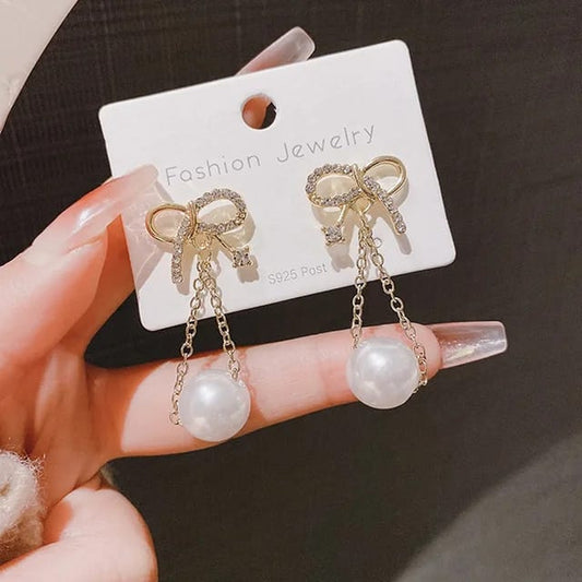 Danglers- Bow Pearls Earrings